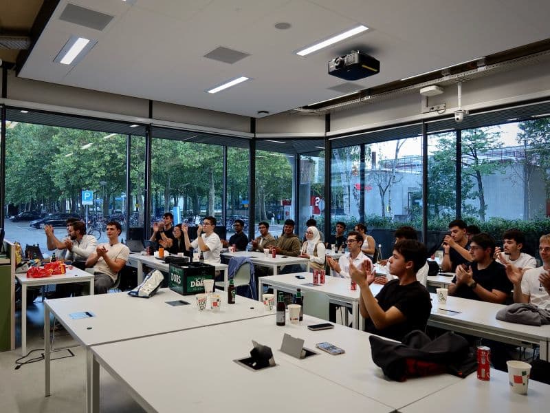Students applauding a pitch at Kickoff's first community event of the season